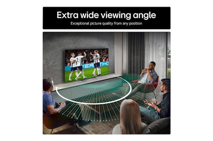 Living room space with a wall-mounted LG OLED TV. On the TV is a mountain range against a dark evening sky filled with stars. This scene is split in half. One side shows a duller, grayer version of the landscape labeled, Non Perfect Black display. On the other side is a more pleasing picture with a larger dynamic range of blacks and whites. 