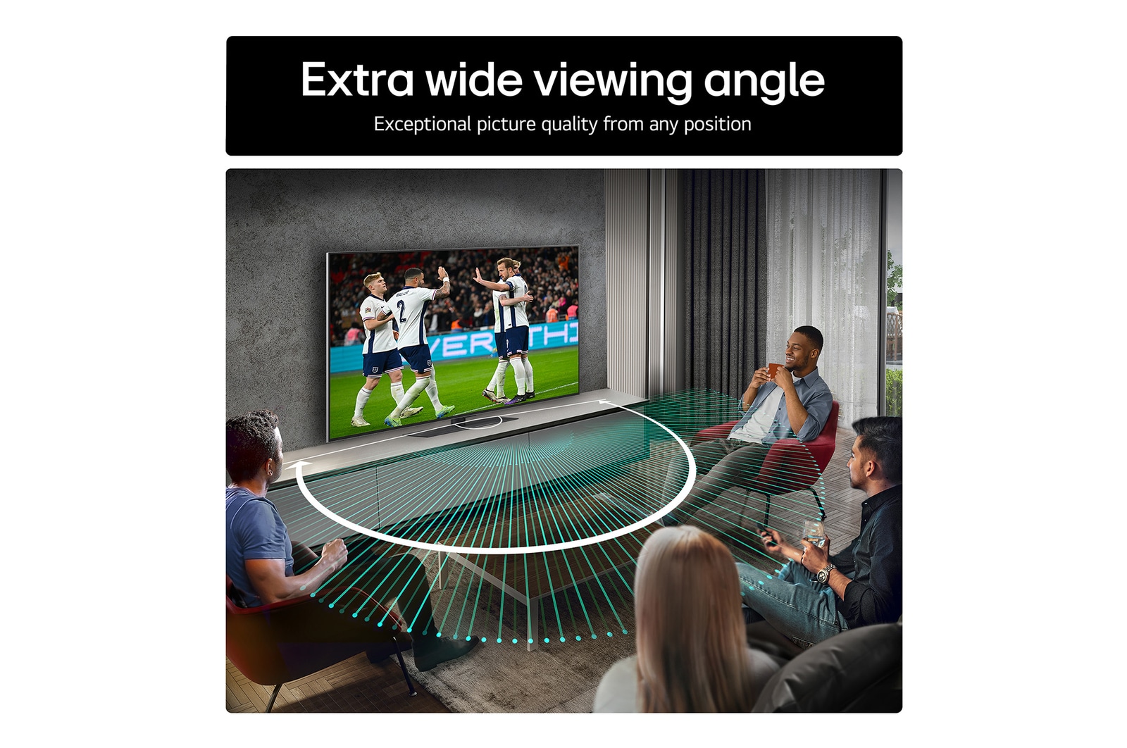 Living room space with a wall-mounted LG OLED TV. On the TV is a mountain range against a dark evening sky filled with stars. This scene is split in half. One side shows a duller, grayer version of the landscape labeled, Non Perfect Black display. On the other side is a more pleasing picture with a larger dynamic range of blacks and whites. 