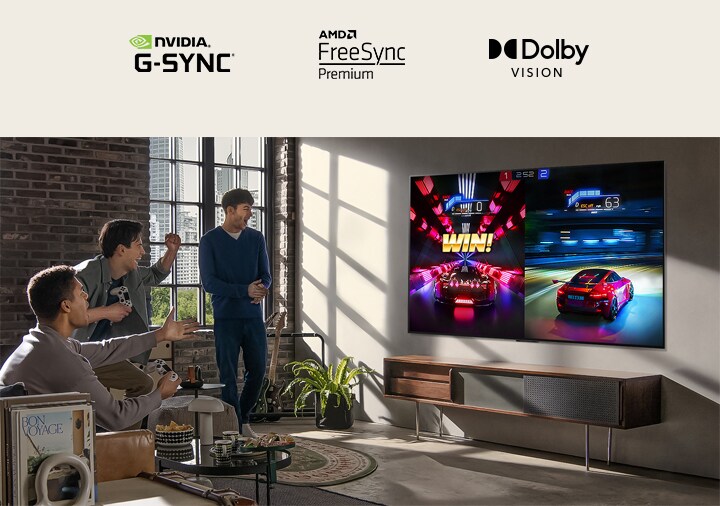 An image of three men playing a racing game on an LG OLED TV in a modern city apartment.