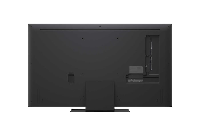 LG TV screen with an AI Magic Remote on the foreground. The AI button is highlighted and a speech bubble shows text, suggest a movie I like. On the screen we see the user icon E, indicating how AI Voice ID was able to identify which user it was and give personalized recommendations just based on their voice.