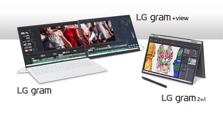 Một người phụ nữ đang cầm LG gram với nụ cười rạng rỡ.