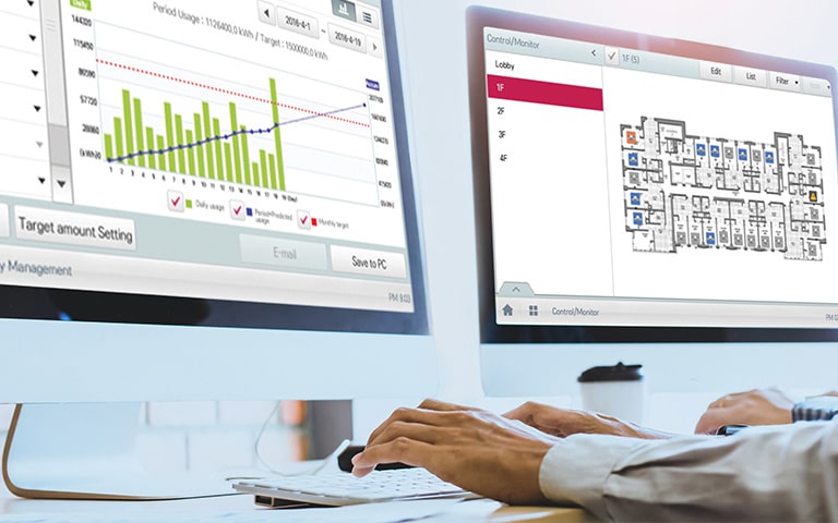 Hình ảnh một người sử dụng màn hình kép để quản lý năng lượng theo mùa.