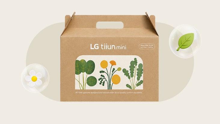 Góc cận thiết kế bao bì bằng giấy xanh của LG tiiun mini nổi bật với nét vẽ sinh thái rực rỡ.