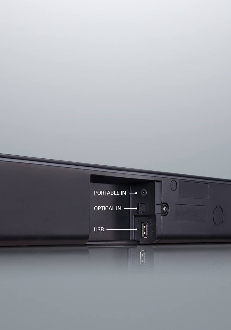Diagonal view of the conncetion terminal. From the top, it shows portable in, optical in, and usb.