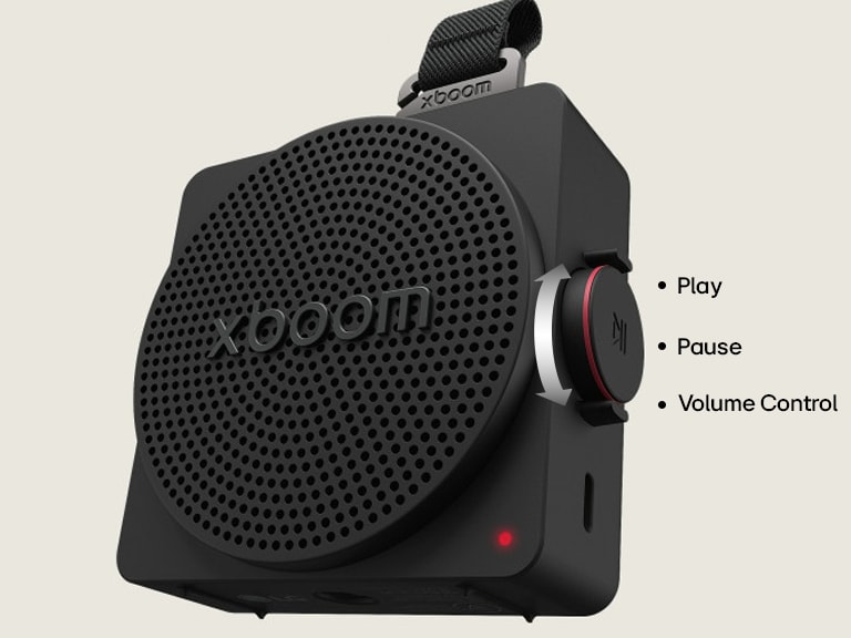 LG xboom mini physical rotary knob for volume control with turn-and-click button for instant access to FYI AI Radio