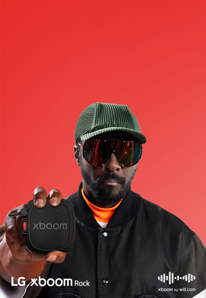 LG xboom Rock held by will.i.am, a portable bluetooth speaker built for outdoors, verified with military-standard testing and dust resistance.