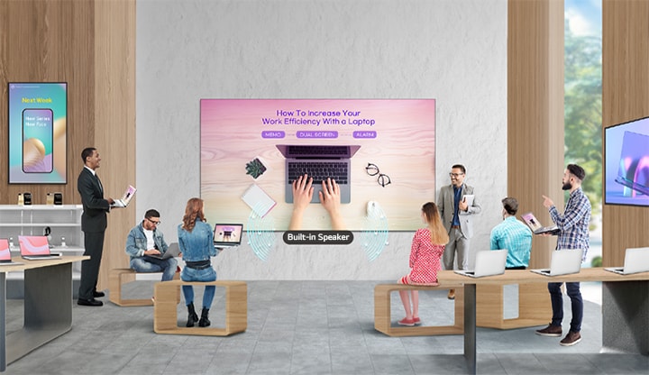 A large LAPA screen mounted on the wall of a retail store is displaying a lecture featuring products, with sound playing through its built-in speaker.	