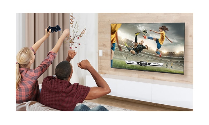 The man and woman are playing games, and the game's scene shown on the TV screen is realistically expressed.