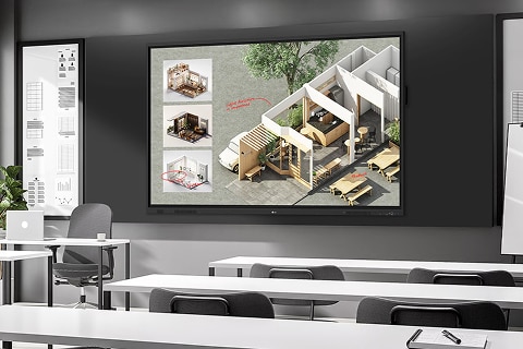 Classroom scene with children seated at desks watching a large screen displaying a 'Space Word Search Puzzle' with planets and stars around the puzzle grid.