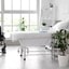 Bright healthcare room with a treatment bed and wheelchair, emphasizing hygiene and care