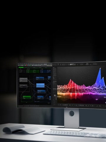 Monitor curvo LG sobre un escritorio que muestra una visualización de datos 3D en colores y diagramas de flujo de trabajo en una oficina oscura.