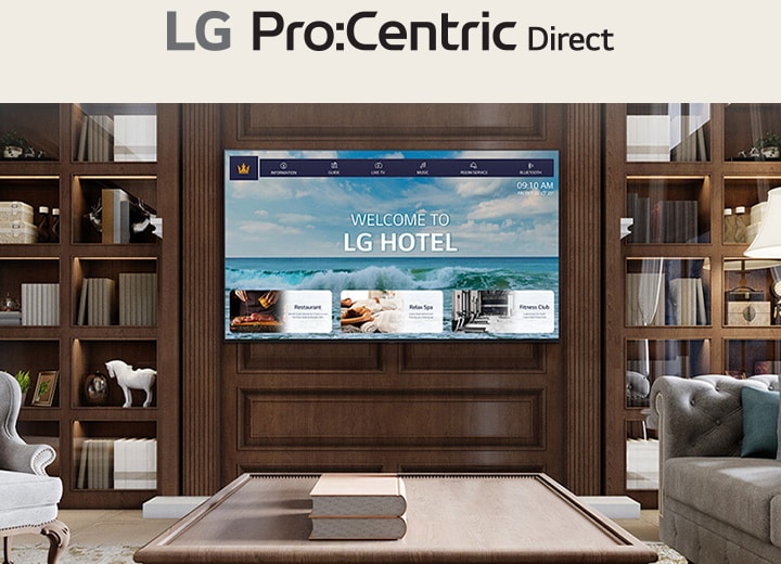 Una habitación de hotel de lujo que cuenta con un televisor en el centro, equipado con LG Pro:Centric, que muestra un mensaje de bienvenida a los huéspedes.