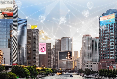 Hierbei handelt es sich um ein abstraktes Bild, das mehrere Anzeigen an verschiedenen Standorten zeigt, die über eine Cloud-Lösung verwaltet werden.