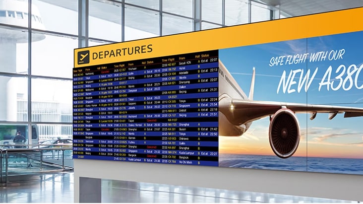 Affichage du mur vidéo LG à l’aéroport affichant les informations de départ du vol