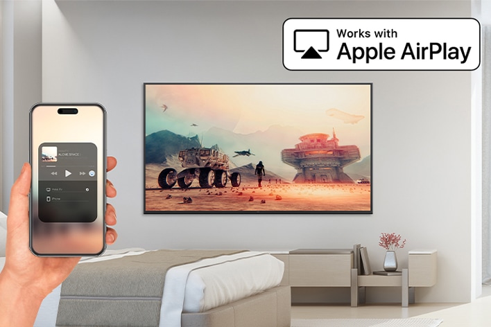 L’image montre que la fonctionnalité AirPlay permet d'afficher le contenu d'un iPhone sur la télévision de la chambre d'hôtel.