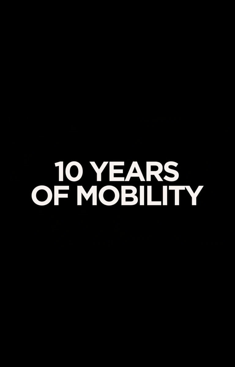 It reads '10 YEARS OF MOBILITY' in white letters on a black background