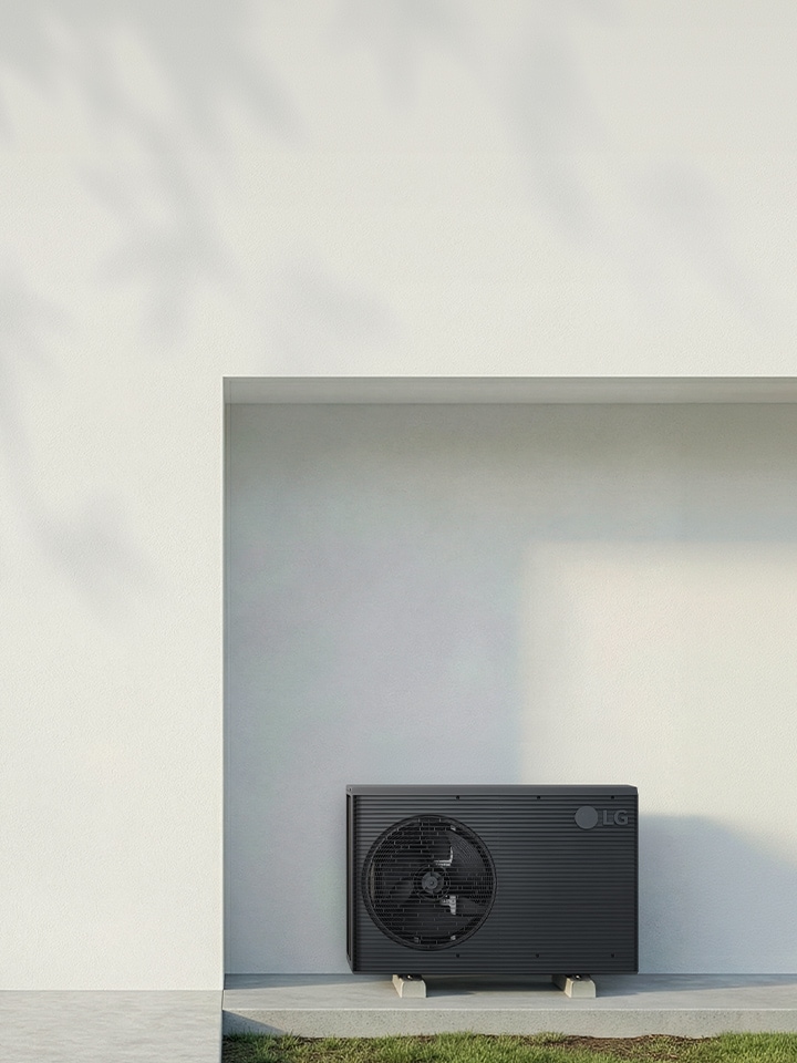 LG THERMA V R290 Monobloc S outdoor unit installed beside a modern exterior wall with clean design and minimal surroundings	