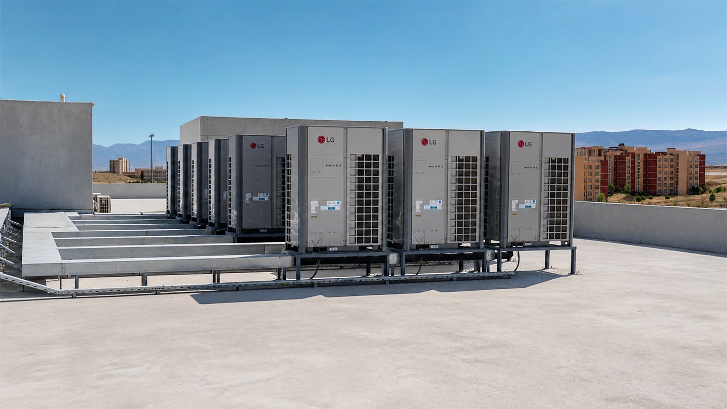 VRFs are installed on the roof of the university building in a regular pattern.