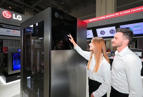 A woman interacting with an LG cooling unit next to product photos of closed.