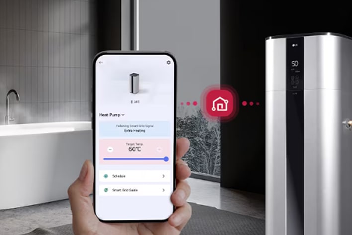 User controlling LG Heat Pump Water Heater via LG ThinQ smartphone app for simplified setup and maintenance.