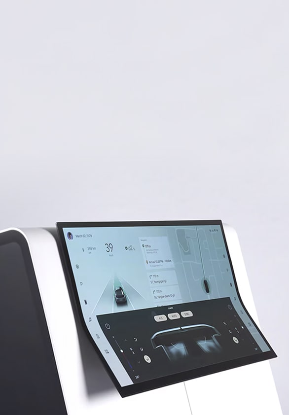 Close-up of a digital car head unit with a large interactive screen, representing intelligence behind the wheel.