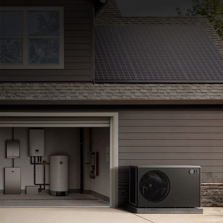 G HVAC outdoor unit installed next to a modern home garage with heat pump and boiler system inside