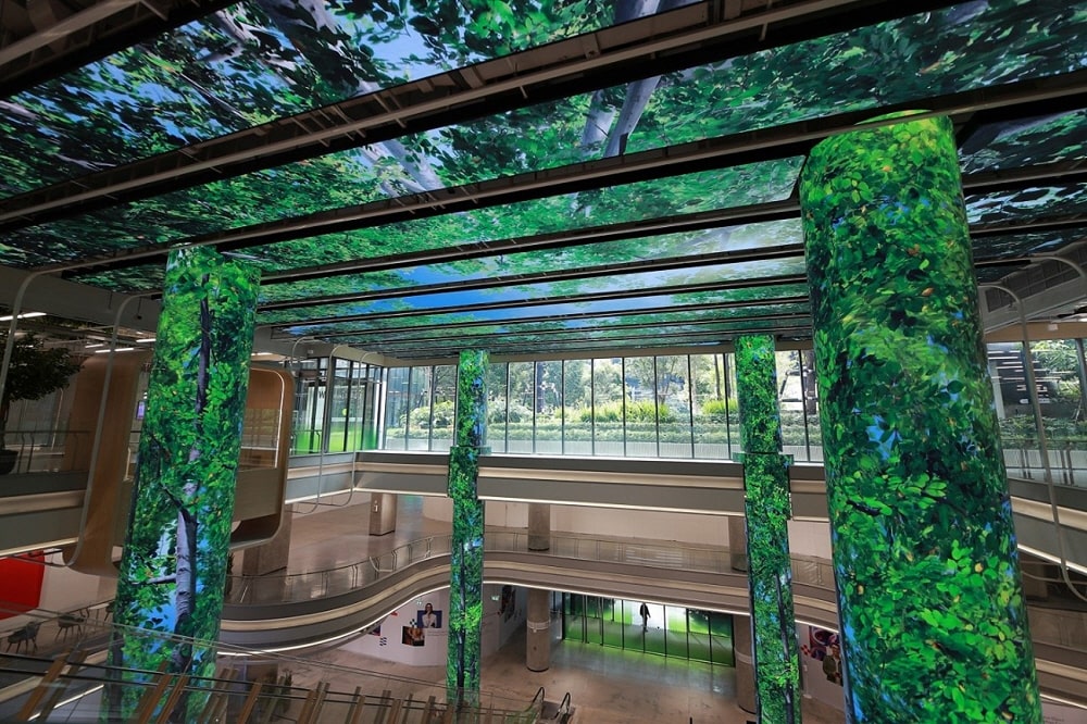 LG’s LED signage expressing images of a forest on the ceiling and pillars of Bangkok’s True Digital Park West.