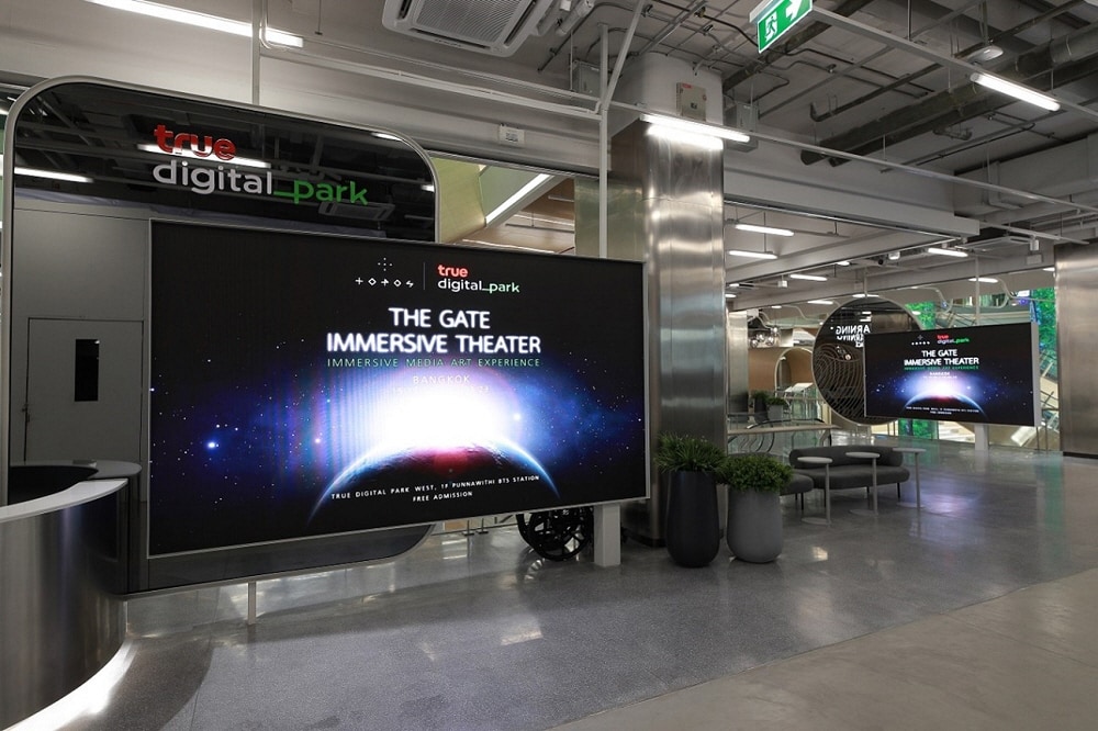 Interior of True Digital Park equipped with LG digital signage and curved LED displays providing an innovative and interactive visual environment.