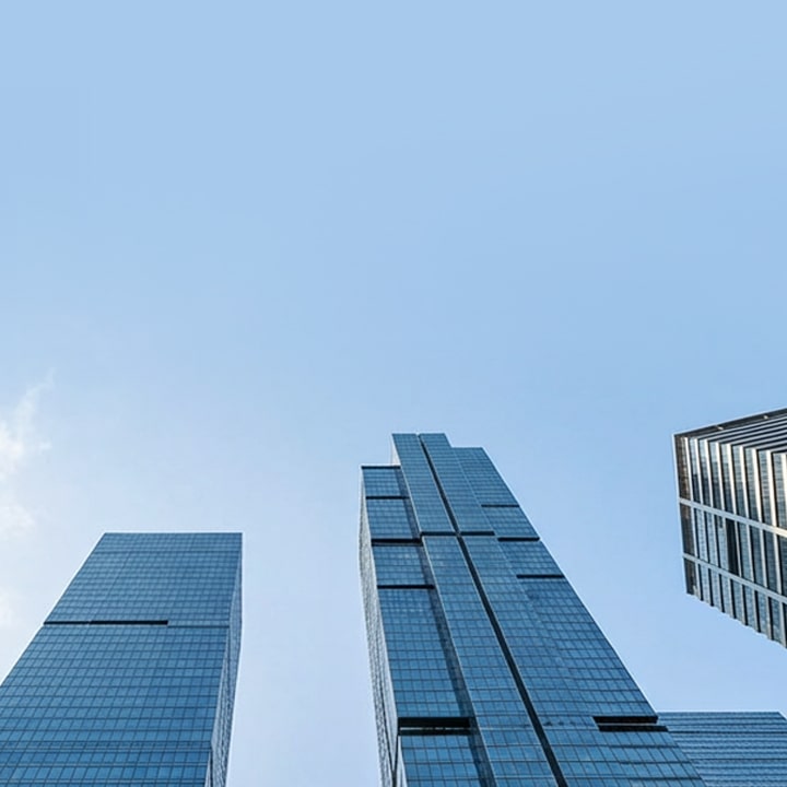 G HVAC outdoor unit installed next to a modern home garage with heat pump and boiler system inside
