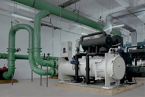 Industrial LG HVAC equipment and machinery installed inside a factory or plant facility.