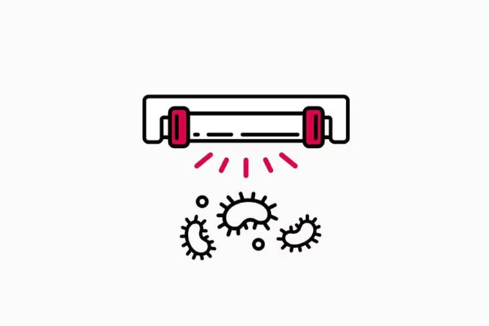 Ultraviolet light emitting rays that kill surrounding bacteria, symbolizing sterilization.