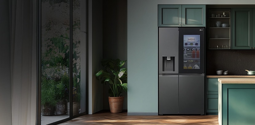 Contemporary green-cabinet kitchen with LG French door refrigerator with door-in-door access in a bright residential setting