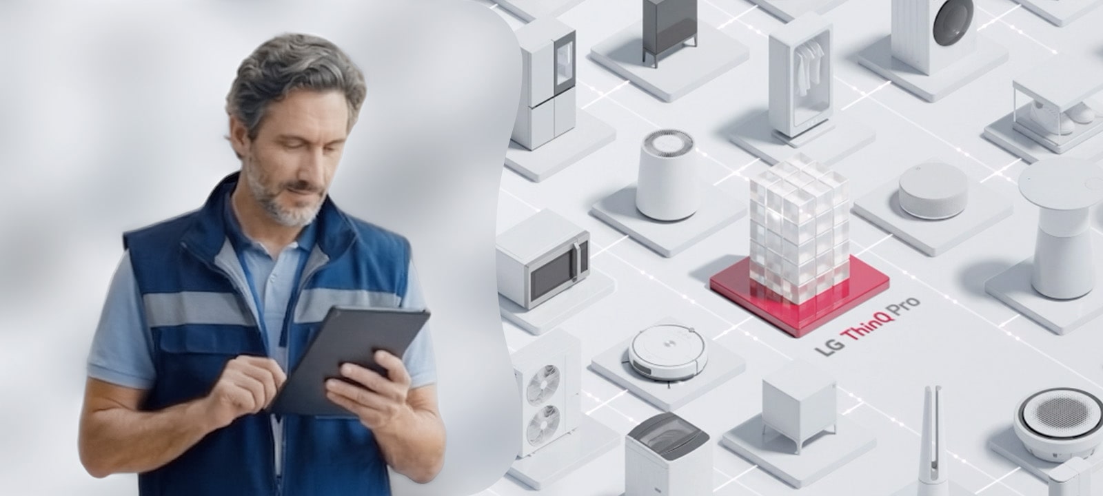 Property manager with tablet and LG ThinQ Pro dashboard, representing centralized property management and cost visibility.