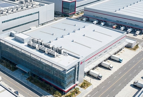 Aerial view of an LG manufacturing facility, representing stable global supply capacity for large-scale projects.