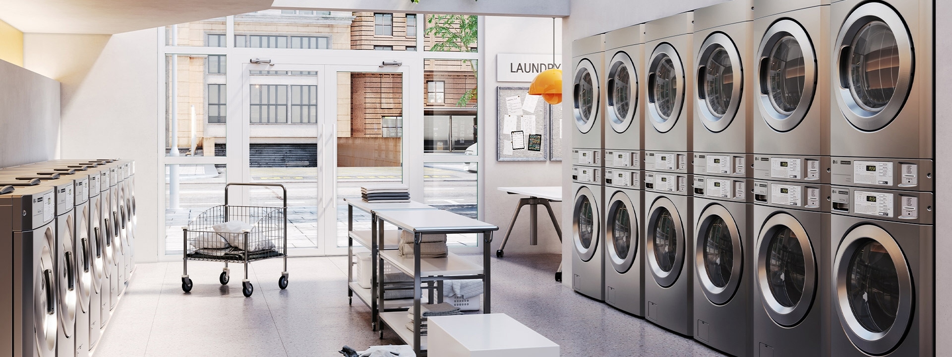 Laundromat with rows of LG commercial washers and dryers