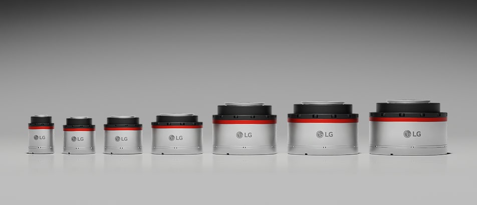 Seven LG joint drive actuators arranged in a row from smallest to largest, each with a cylindrical metal body and black top