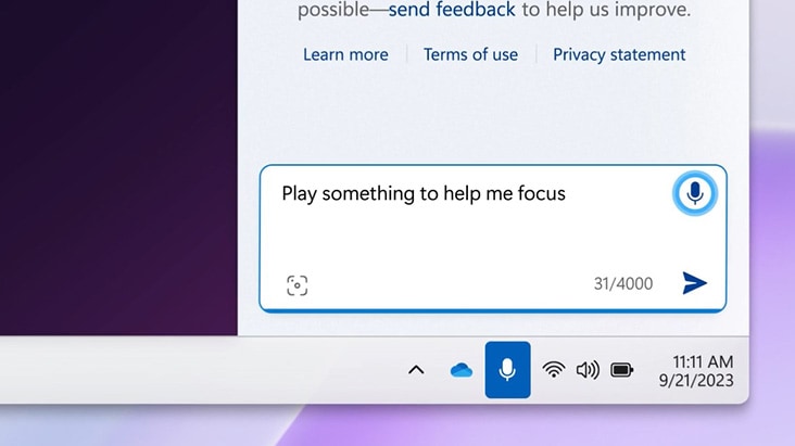 The image shows a digital assistant input box where the user types, "Play something to help me focus." It’s part of a Windows taskbar interface, with standard system icons below, indicating a request for focus music. The image shows a digital assistant input box where the user types, "Play something to help me focus." It’s part of a Windows taskbar interface, with standard system icons below, indicating a request for focus music.