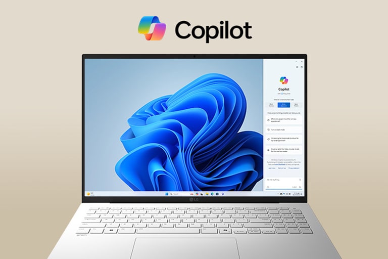 A laptop featuring the Windows Copilot logo above the screen and Windows Copilot interface on the display, showcasing a sleek design with a large screen and the Windows 11 interface in the background.	