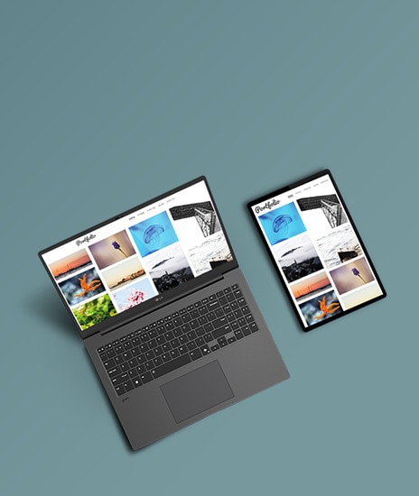 This image shows a laptop and a tablet side by side, both displaying the same portfolio website. The screens feature a grid of images, including nature and architectural photos, highlighting seamless synchronization between devices.