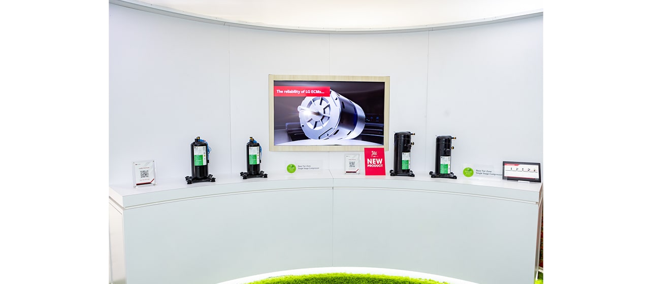 LG residential products zone at AHR 2023 featuring various compressors