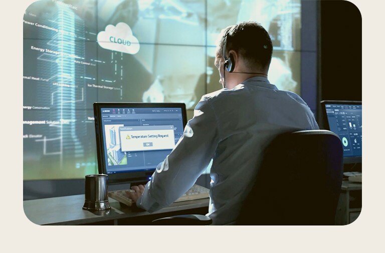 This image shows a man using an hvac solution to manage the hvac system.