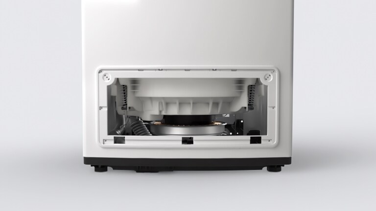 A close-up image of a washing machine with the front panel removed, revealing the internal components. The motor and other parts are clearly visible.