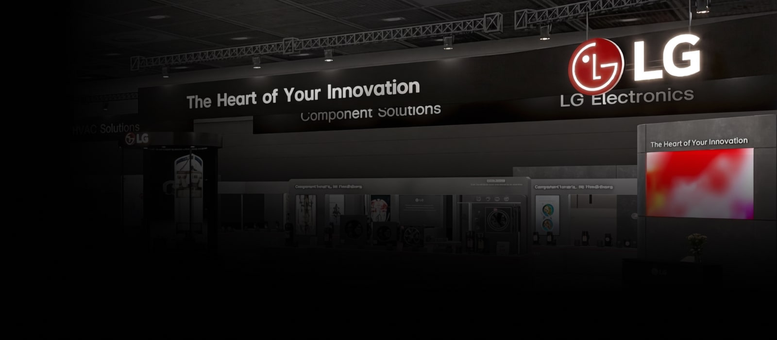 LG Electronics exhibition booth with an overhead banner reading “The Heart of Your Innovation Component Solutions” and the LG logo.