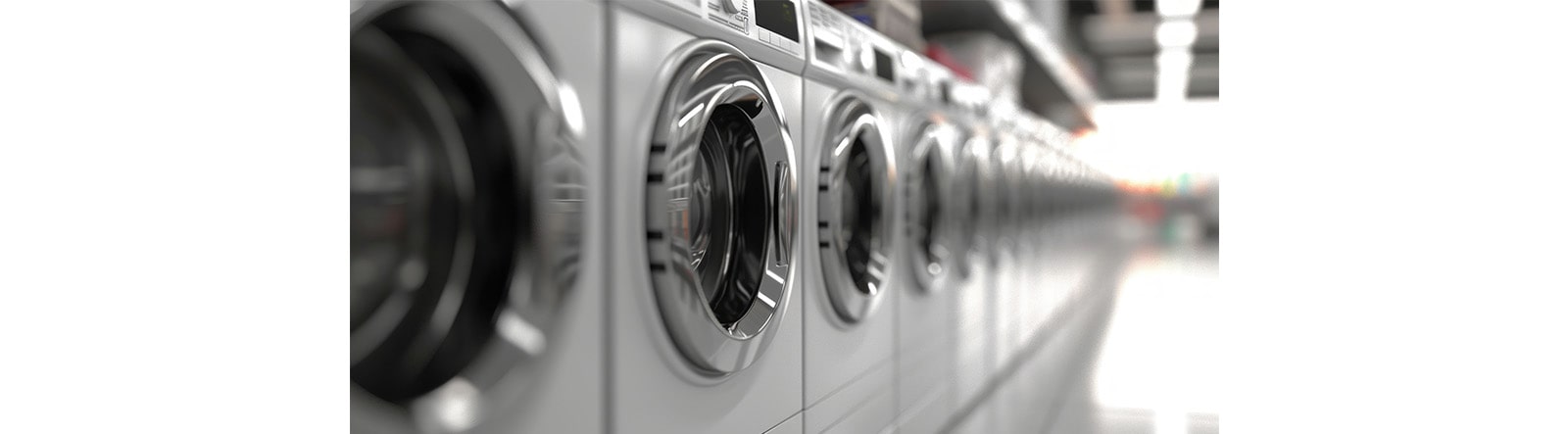 A row of silver color washing machines