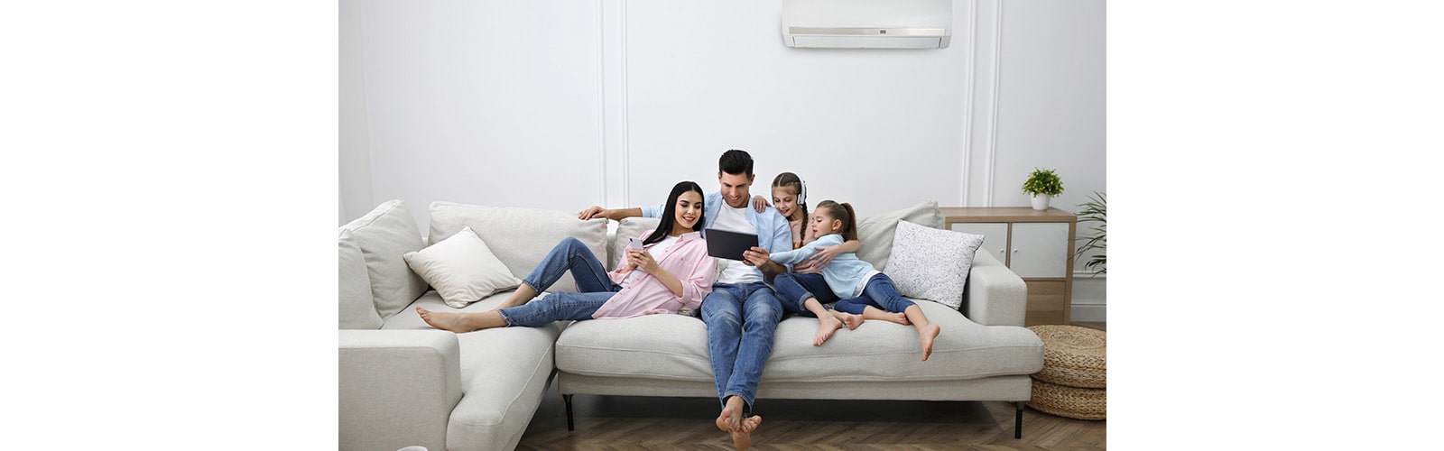 A Family Enjoying the Air Conditioning