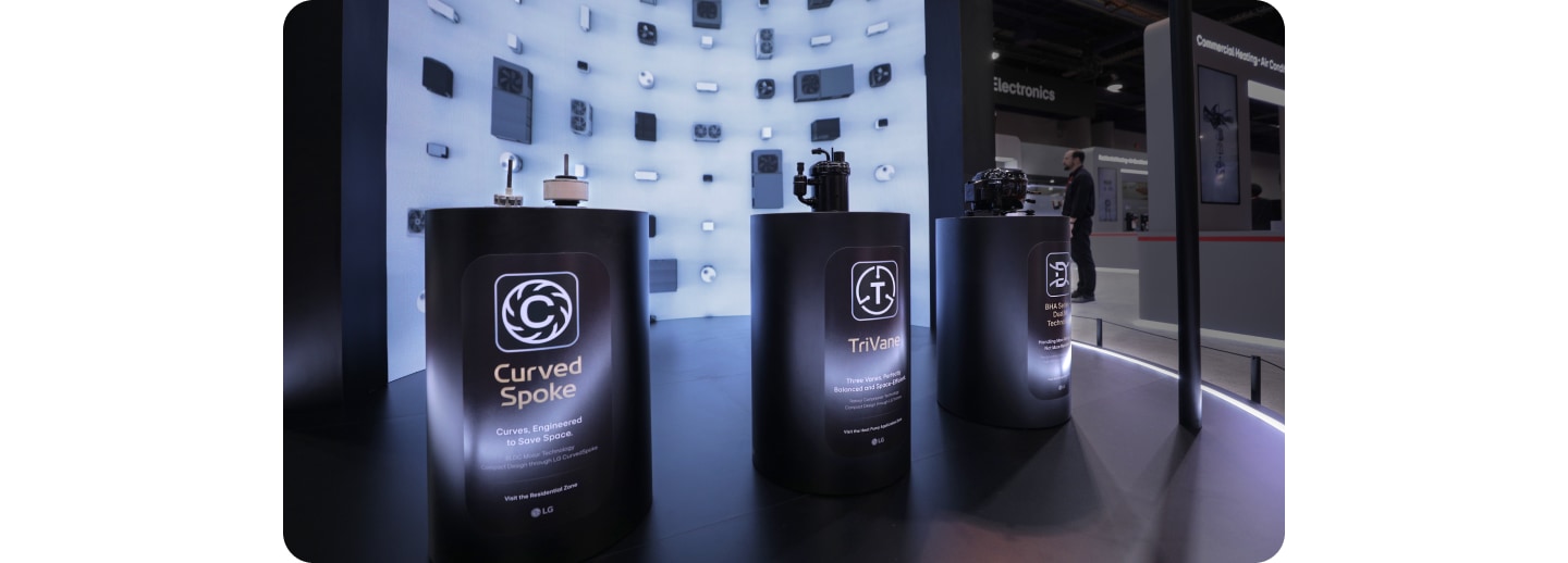 LG's innovative HVAC components like Curved Spoke and TriVane on display against a digital screen at AHR Expo 2026.
