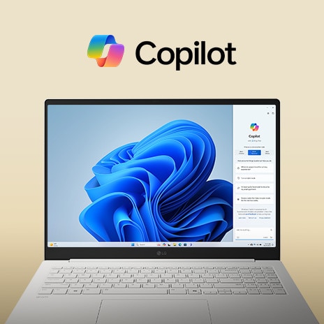 A laptop featuring the Windows Copilot logo above the screen and Windows Copilot interface on the display, showcasing a sleek design with a large screen and the Windows 11 interface in the background.