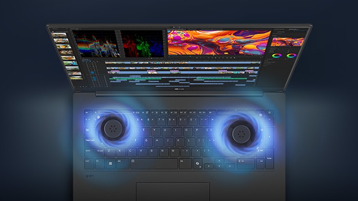 A laptop with a video editing interface on its screen, showcasing dual cooling fans emitting blue airflow visuals, emphasizing advanced cooling technology.