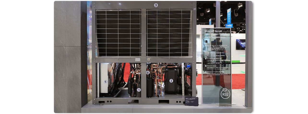 Inverter scroll heat pump chiller with R32 refrigerant, smart control, and modular design at AHR 2025.