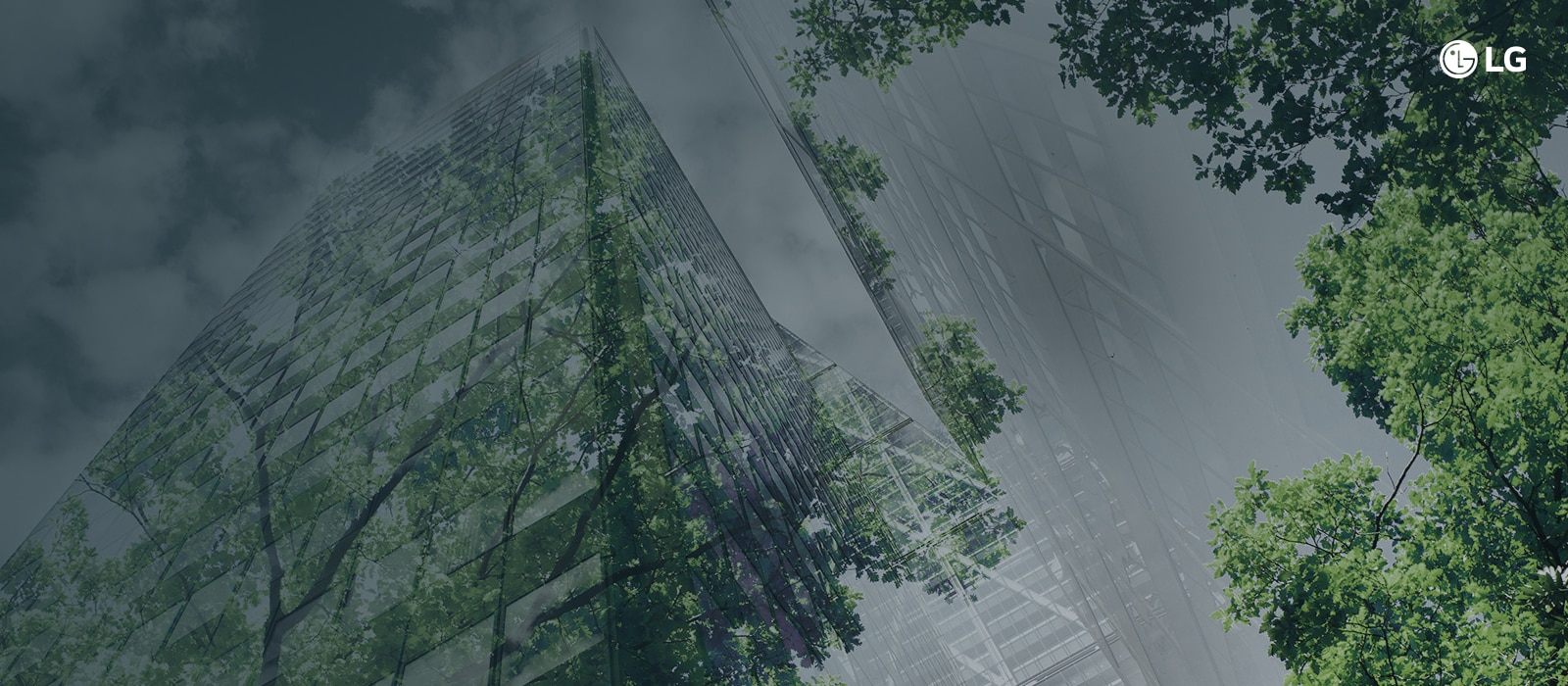 An image of a modern high-rise building intertwined with greenery, emphasizing its environmentally sustainable design elements.